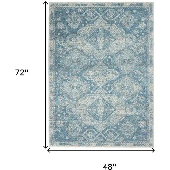 Ivory and Light Blue Oriental Distressed Area Rug Photo 3