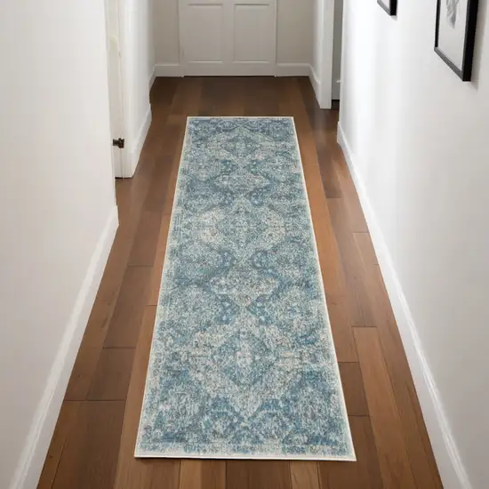 Ivory and Light Blue Oriental Distressed Area Rug Photo 1