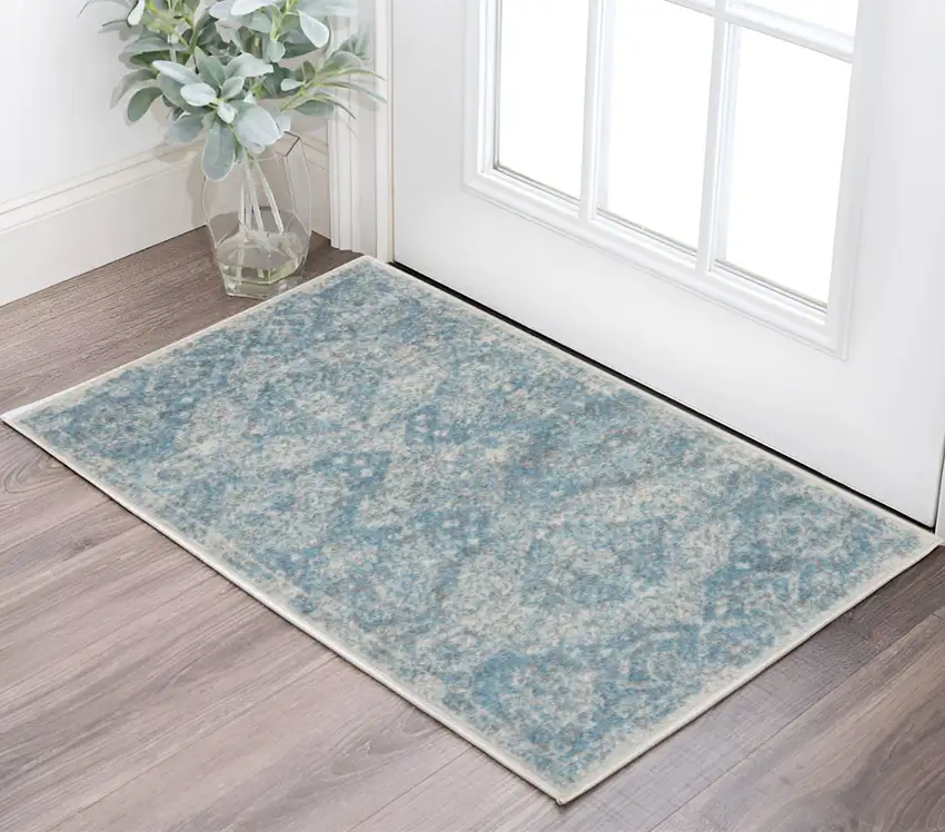 Ivory and Light Blue Oriental Distressed Area Rug Photo 1