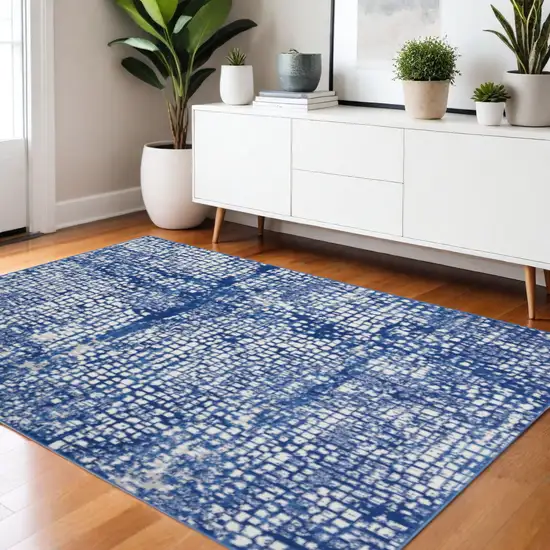Ivory And Blue Geometric Area Rug Photo 2
