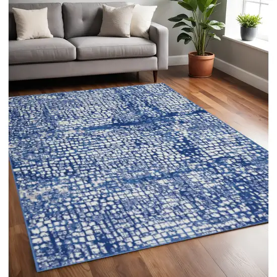 Ivory And Blue Geometric Area Rug Photo 2