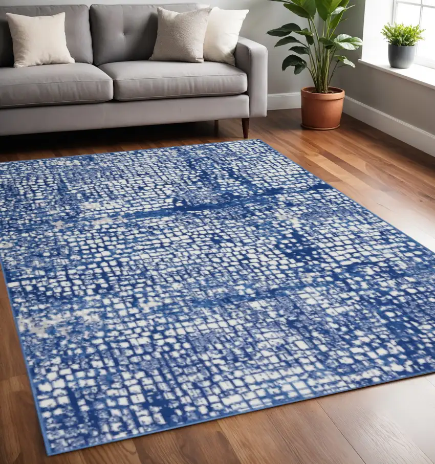 Ivory And Blue Geometric Area Rug Photo 2