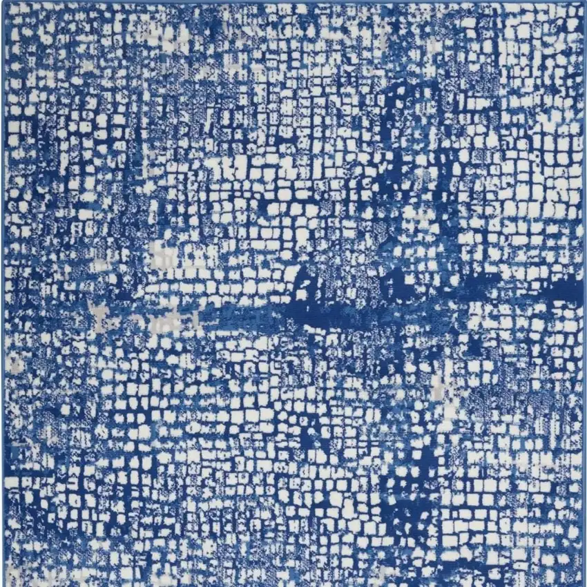 Ivory And Blue Geometric Area Rug Photo 1