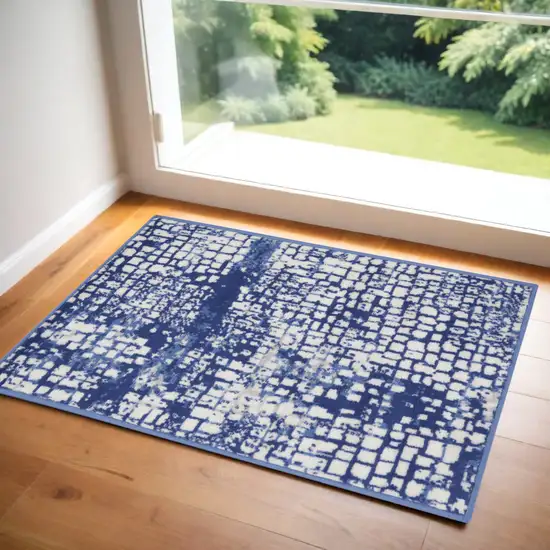 Ivory and Navy Blue Abstract Area Rug Photo 2