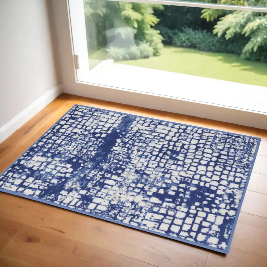 Ivory and Navy Blue Abstract Area Rug Photo 2