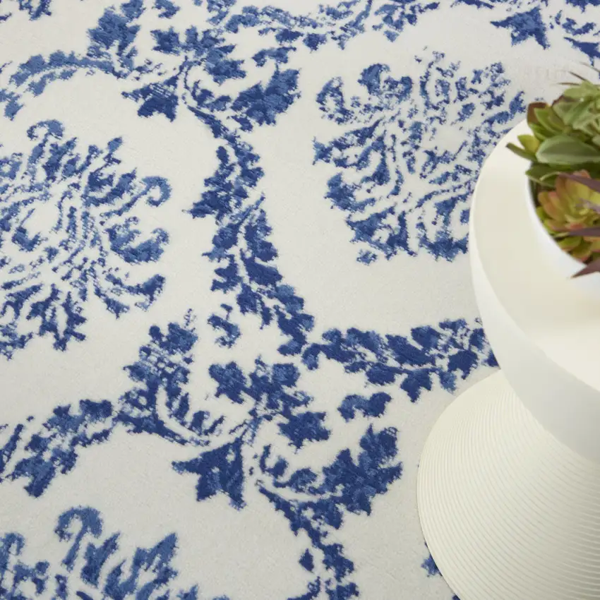 Ivory And Blue Damask Distressed Area Rug Photo 8