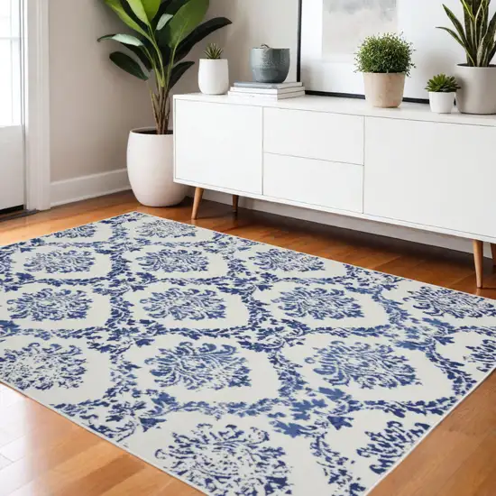 Ivory And Blue Damask Distressed Area Rug Photo 2