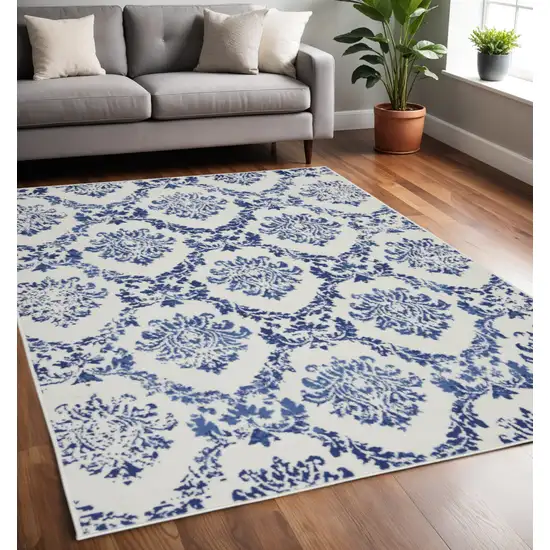 Ivory And Blue Damask Distressed Area Rug Photo 2