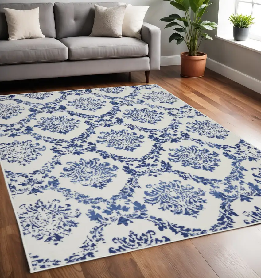 Ivory And Blue Damask Distressed Area Rug Photo 2