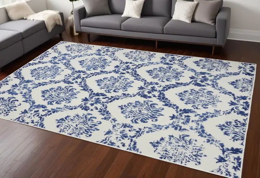 Blue And Ivory Floral Dhurrie Area Rug Photo 1
