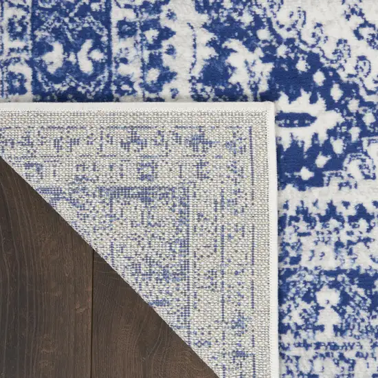 Ivory And Blue Geometric Distressed Area Rug Photo 9