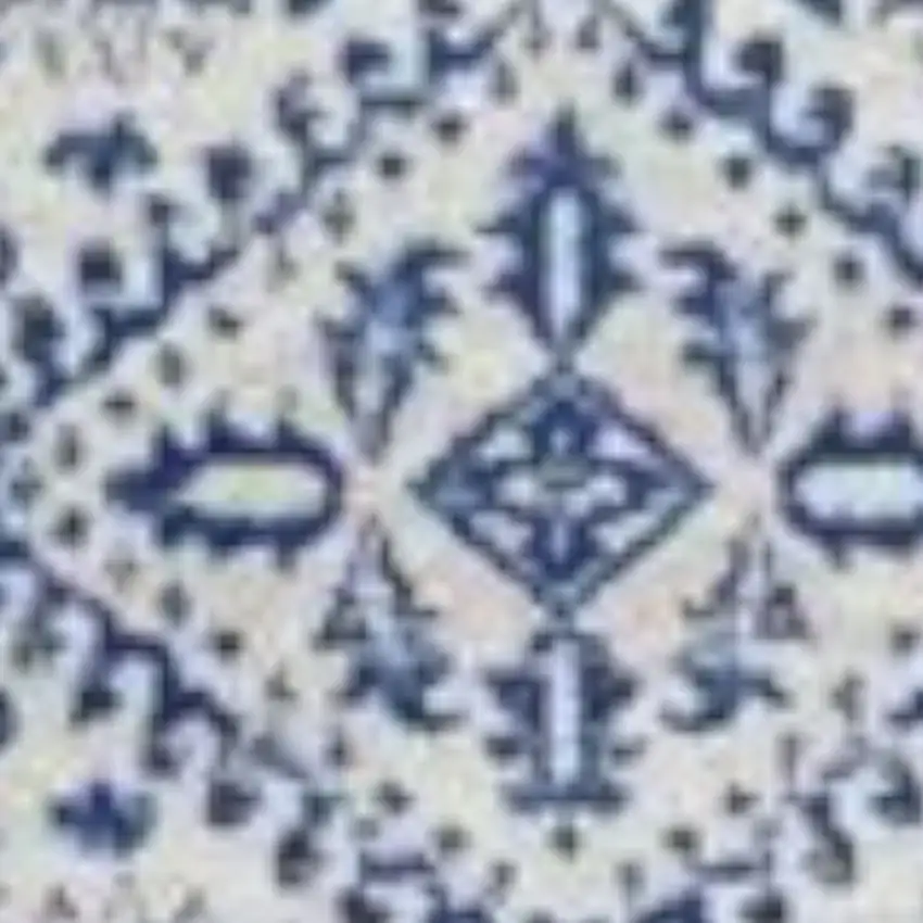 Ivory And Blue Geometric Distressed Area Rug Photo 1