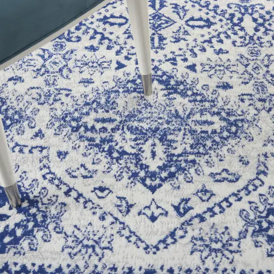 Ivory And Blue Geometric Distressed Area Rug Photo 9