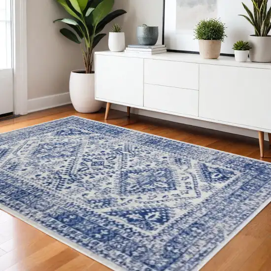 Ivory And Blue Geometric Distressed Area Rug Photo 2