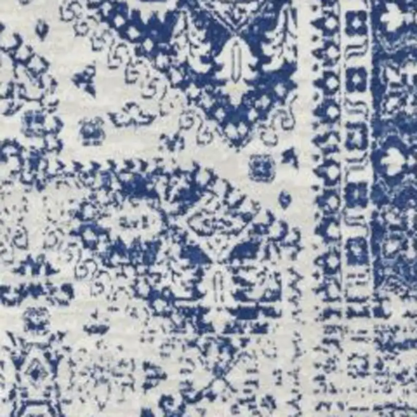 Ivory And Blue Geometric Distressed Area Rug Photo 3