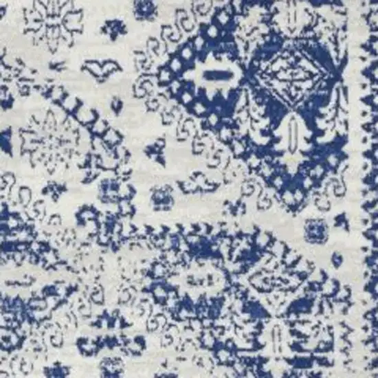 Ivory And Blue Geometric Distressed Area Rug Photo 3
