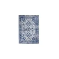 Photo of Ivory and Navy Geometric Area Rug
