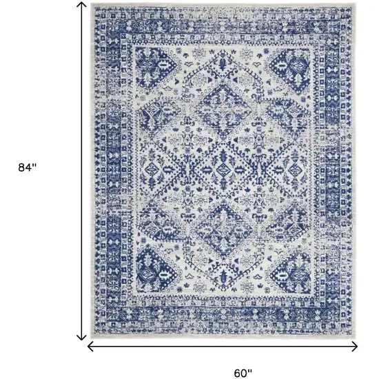 Ivory And Blue Geometric Distressed Area Rug Photo 4