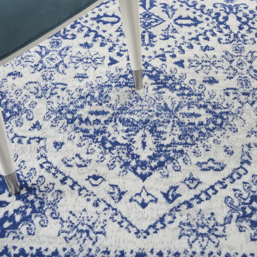 Ivory And Blue Geometric Distressed Area Rug Photo 9