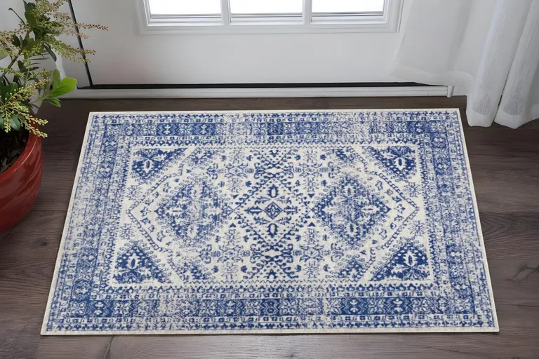Ivory and Navy Geometric Area Rug Photo 2