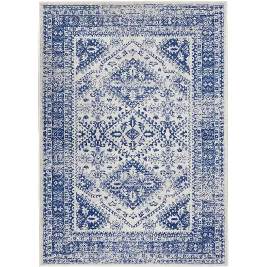 Ivory And Blue Geometric Distressed Area Rug Photo 1