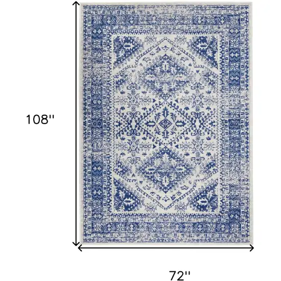 Ivory And Blue Geometric Distressed Area Rug Photo 4