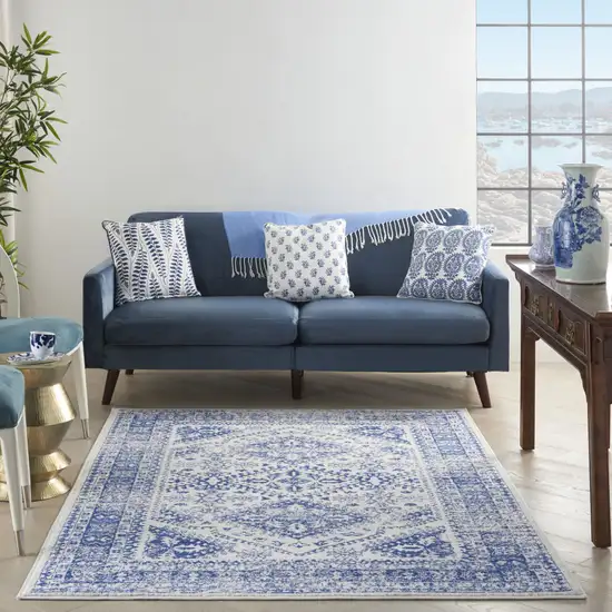Ivory And Blue Geometric Distressed Area Rug Photo 6