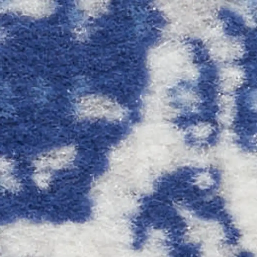 Ivory And Blue Geometric Distressed Area Rug Photo 1