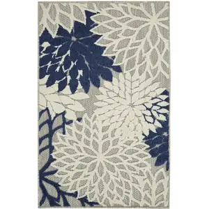 Photo of Ivory and Navy Indoor Outdoor Area Rug