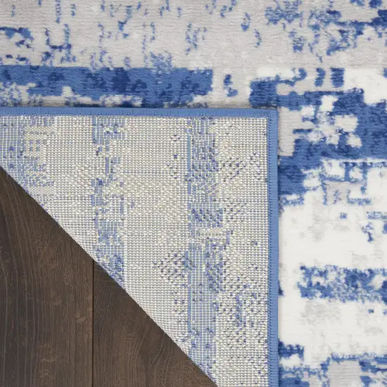 Ivory And Blue Ombre Distressed Area Rug Photo 9