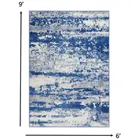 Photo of Ivory and Navy Oceanic Area Rug