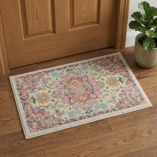 Pink And Ivory Southwestern Distressed Area Rug Photo 1