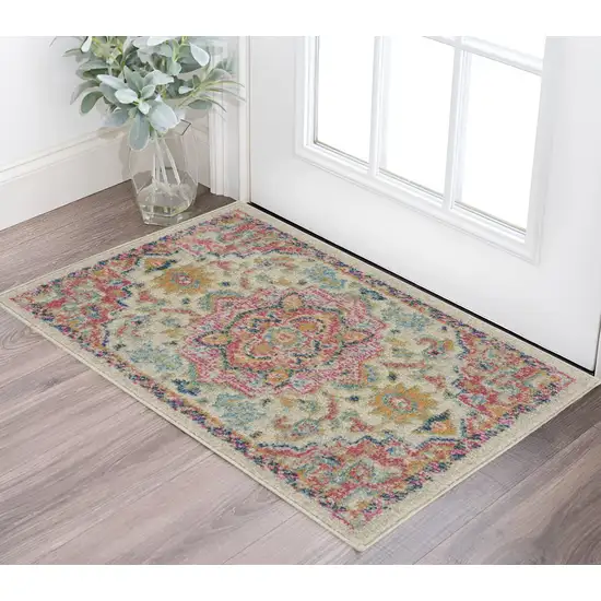 Pink And Ivory Southwestern Distressed Area Rug Photo 1