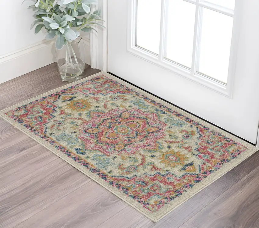 Pink And Ivory Southwestern Distressed Area Rug Photo 1