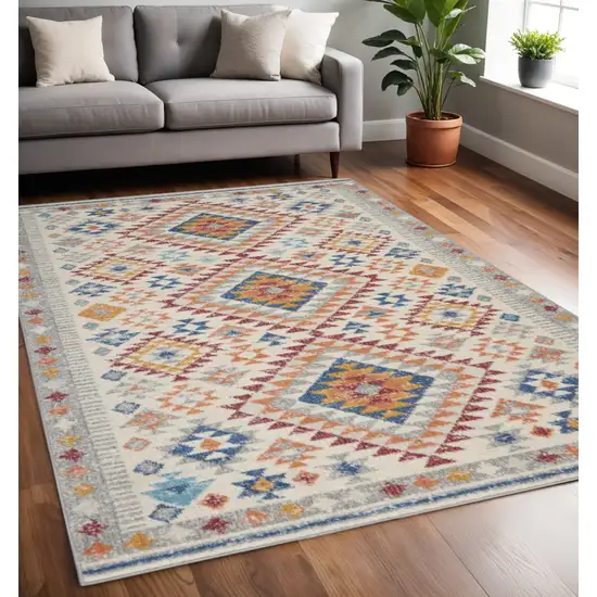 Ivory And Blue Geometric Area Rug Photo 2