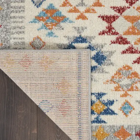Ivory And Blue Geometric Area Rug Photo 9