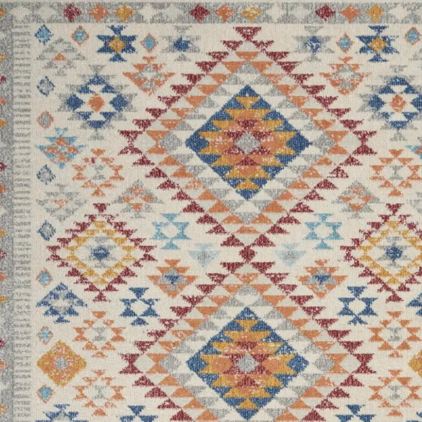 Ivory And Blue Geometric Area Rug Photo 1