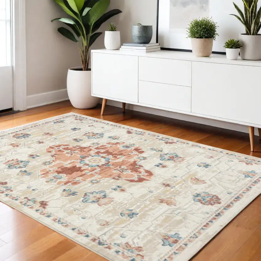 Ivory and Red Medallion Power Loom Area Rug Photo 1