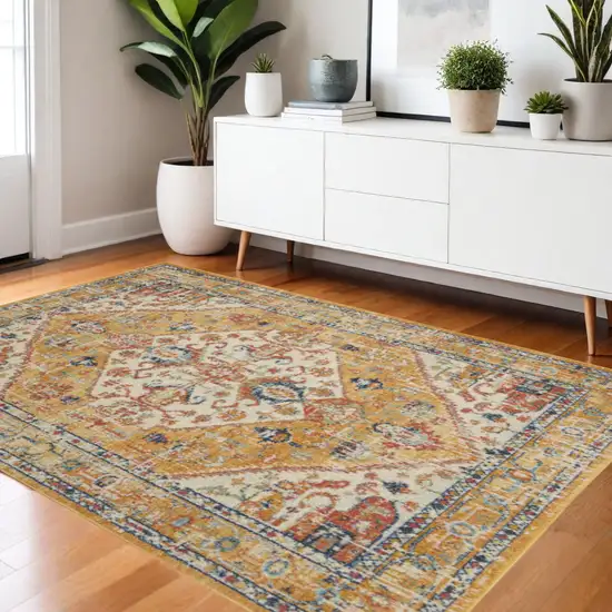 Yellow And Ivory Medallion Area Rug Photo 1