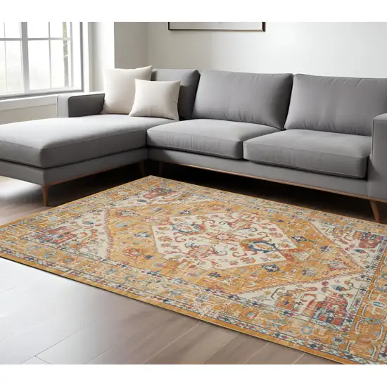 Yellow And Ivory Medallion Area Rug Photo 1