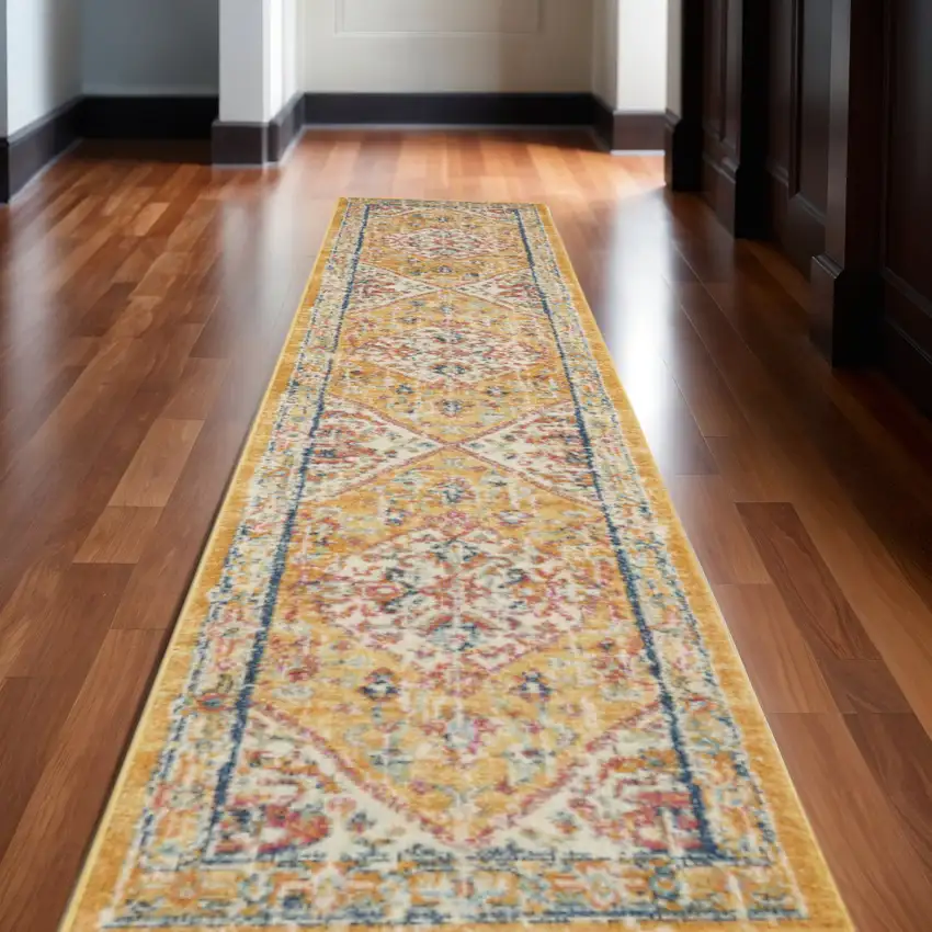 10' Yellow And Ivory Medallion Runner Rug Photo 1