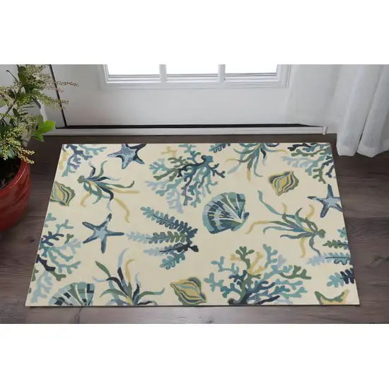 Ivory and Blue Seashell and Coral Hand Tufted Area Rug Photo 1