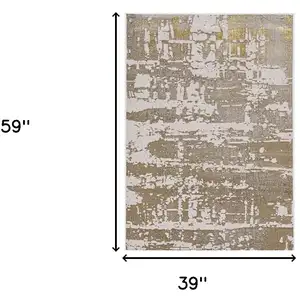 Photo of Ivory or Gold Abstract Area Rug