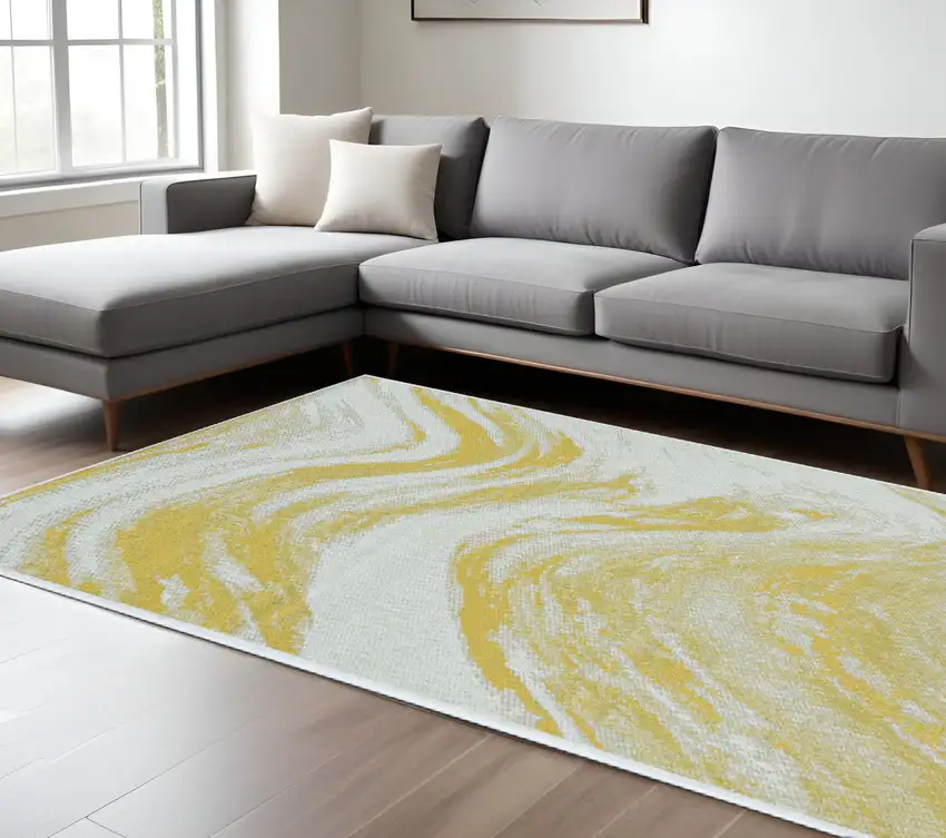 Ivory And Gold Abstract Area Rug Photo 1