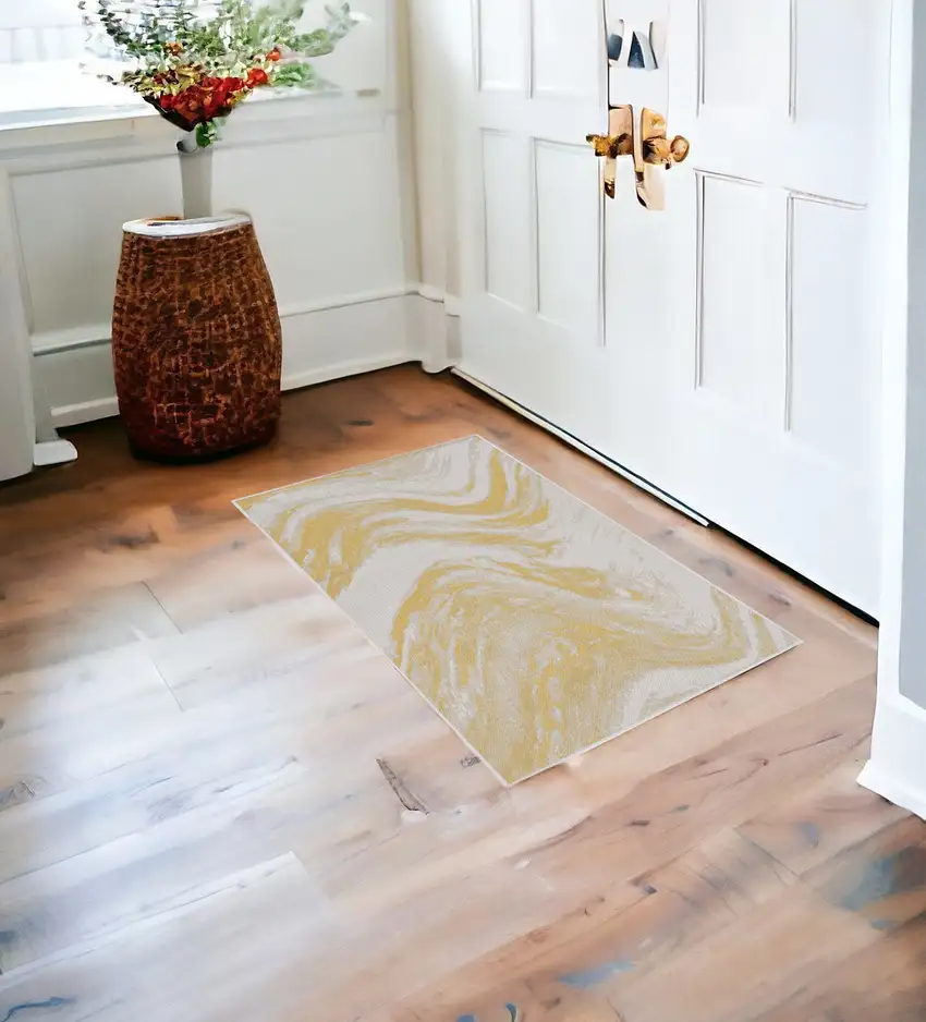 Ivory Or Gold Polypropylene Area Rug Photo 1