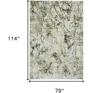 Photo of Ivory or Gold Polypropylene or Viscose Rug
