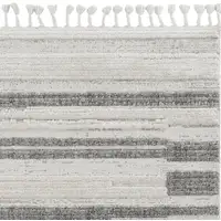 Photo of Ivory or Grey Abstract Brushstrokes Indoor Area Rug with Fringe