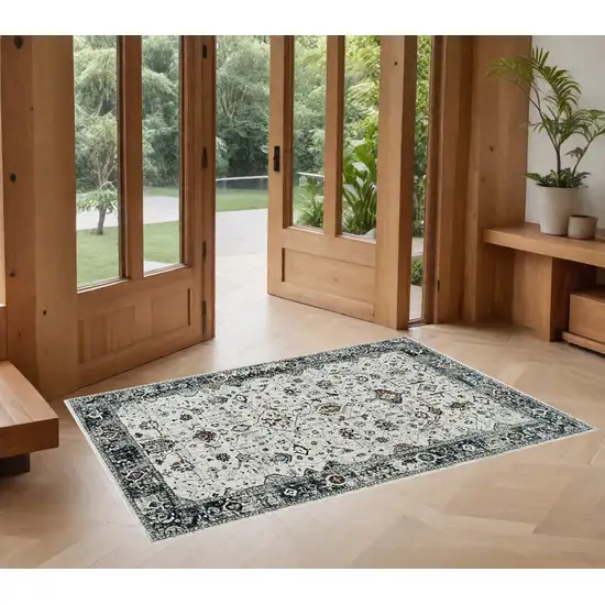 Ivory Or Grey Bordered Area Rug Photo 1