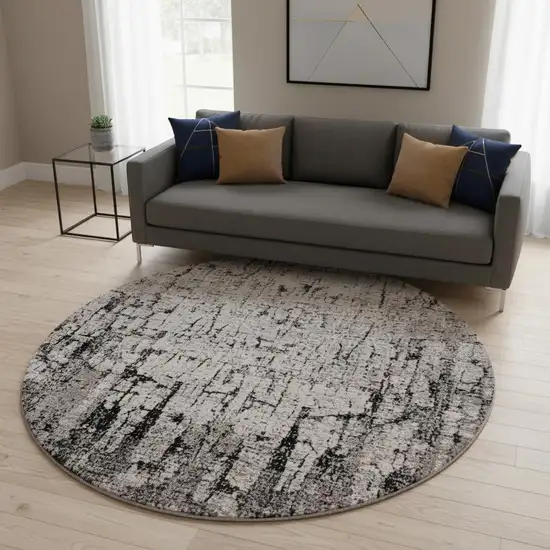 8' Gray and Ivory Round Area Rug Photo 1