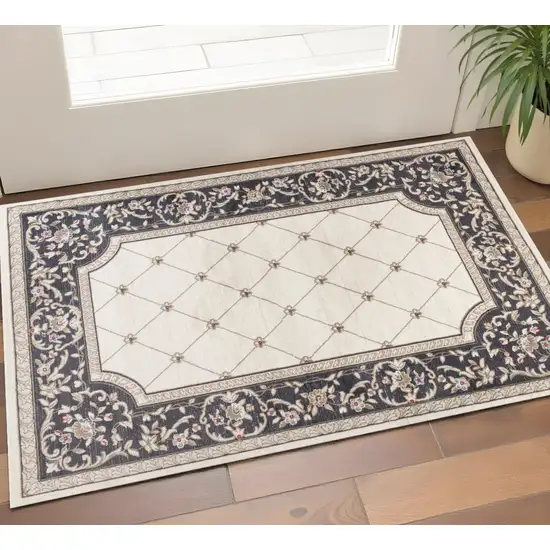 Gray And Ivory Floral Area Rug Photo 1